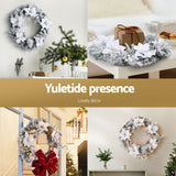 Jingle Jollys 60cm Pre-Lit Christmas Wreath with Snow-Flocked Design and LED Lights - 45-Degree Angle