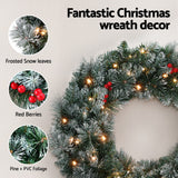 Jingle Jollys 60cm Illuminated Snow-Frosted Christmas Wreath with Red Berry Accents - Top-Down View