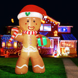Jingle Jollys Christmas Inflatable Gingerbread Man 2.4M Illuminated Decorations - Low Angle
