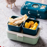 Monbento Tresor Graphic Kids's Bento Box- Cosmic Blue Cosmic Blue - 45-Degree Angle