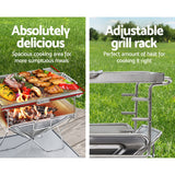 Versatile Stainless Steel Outdoor Fire Pit BBQ with Adjustable Cooking Rack for Camping and Tailgating - Close-Up Angle
