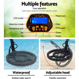 Yellow LCD Metal Detector with Headphones for Beach and Treasure Hunting - Top-Down View