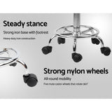 Modern White PU Leather Swivel Saddle Stool for Salon and Beauty Studio - Low Angle
