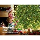 Enchanting 1.8M Warm White LED Christmas Tree with 874 Lush Tips and Radiant Lights - Top-Down View